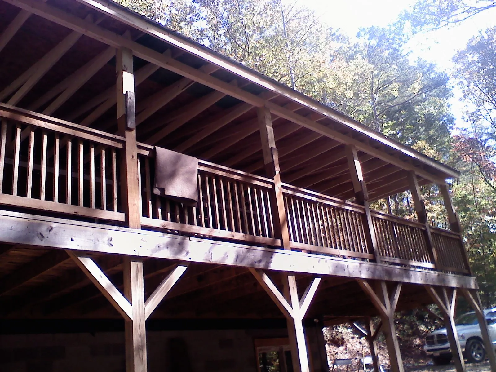 Timber framing under a new elevated porch and deck — Roof Leak Repair in Brookston by Roofing Brothers